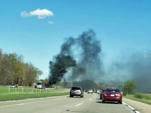 Pillar of Black Smoke Beside the Expressway